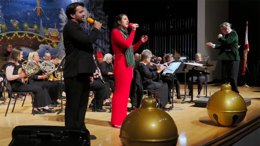 Aaron Santos and Danielle Avicolli singing with the Southwest Florida Concert Band